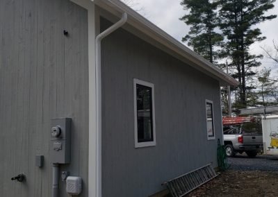 Seamless gutter installation near Middlebury Vermont — aluminum K-style gutters by The Gutter Guys