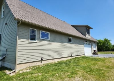 Seamless gutter installation on a Vermont farmhouse — The Gutter Guys serving Addison County