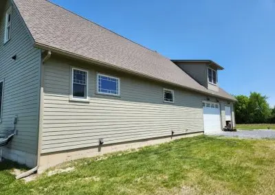 Professionally installed seamless aluminum gutters on a Vermont home — The Gutter Guys