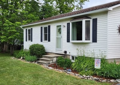 Custom aluminum gutters installed on a Vermont home near Cornwall — The Gutter Guys