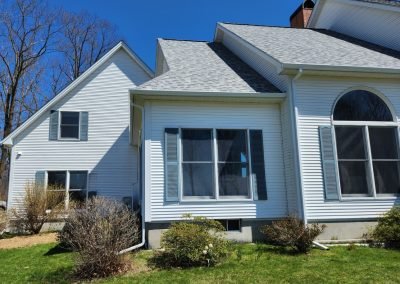 Custom seamless gutters on a Vermont home near Shelburne — The Gutter Guys