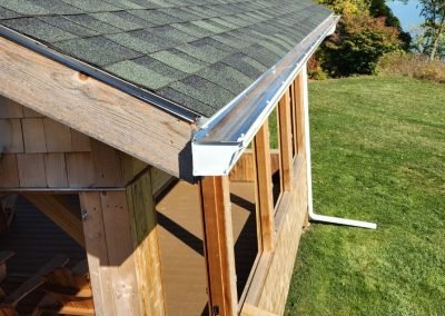 Completed seamless aluminum gutter installation on a Vermont property — The Gutter Guys Addison VT